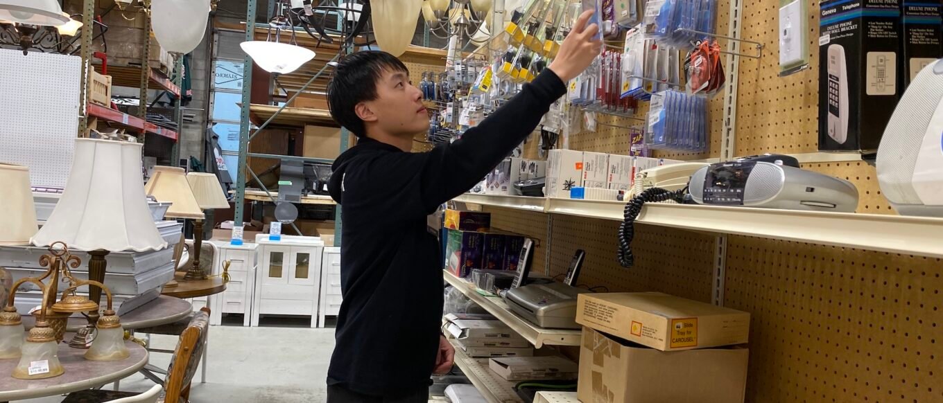 Haonan working at the Habitat for Humanity Restore