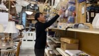 Haonan working at the Habitat for Humanity Restore